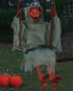 Leuchtender Kürbis Zombie Auf Schaukel 90 Cm